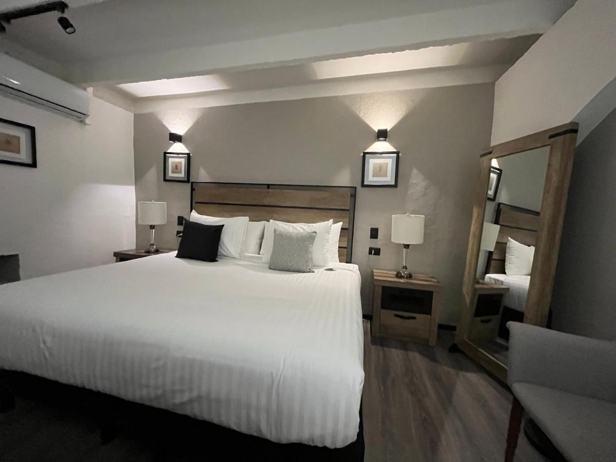 Solsticio 212 Aparthotel Cholula Bagian luar foto